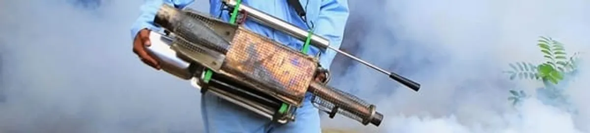 Fumigation technician using a fogger for deep pest treatment in San Francisco, CA